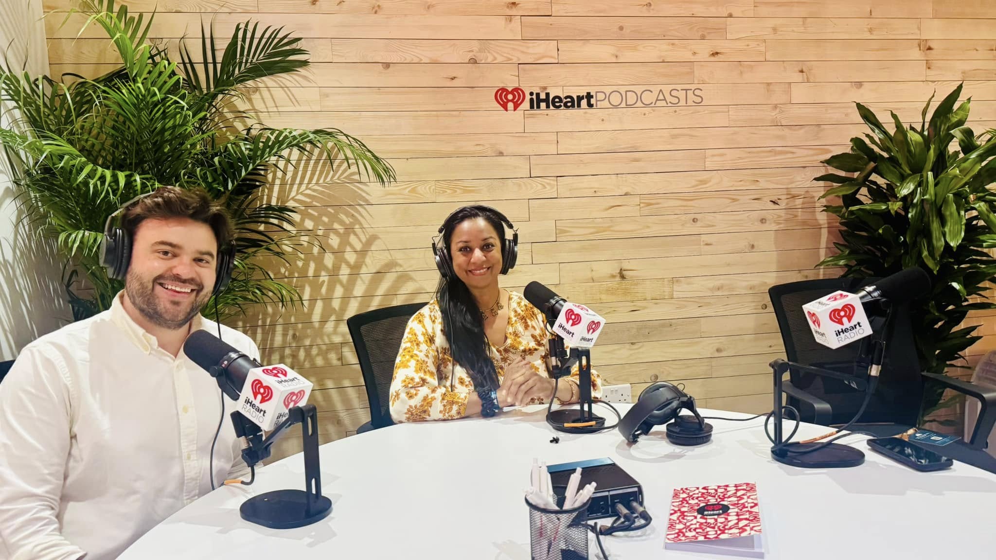 Anu Bhardwaj recording at the iHeart Podcasts studio at Web Summit Qatar 2025