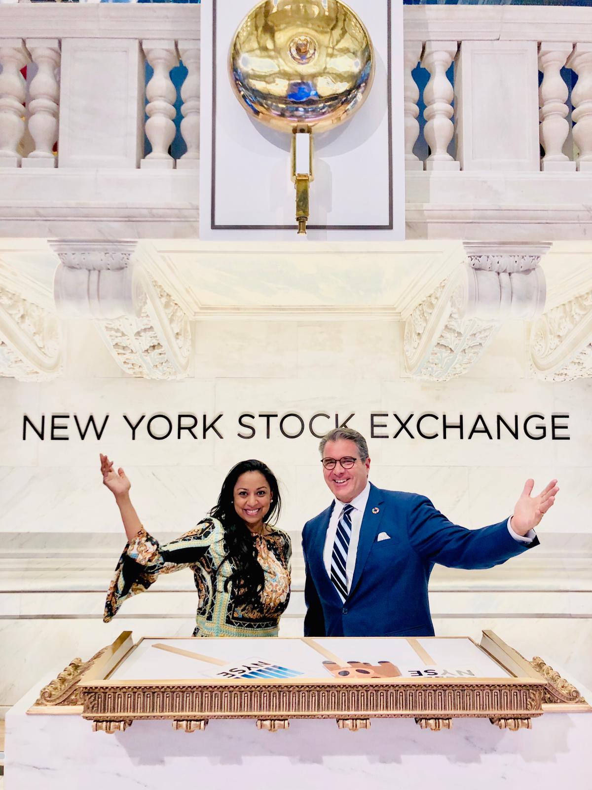 Anu Bhardwaj celebrating at the NYSE bell podium — June 4, 2019