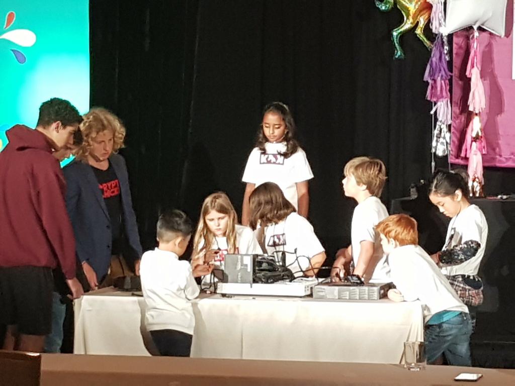 Krypto for Kids computer-building workshop — children gathered around the mining rig table, Blockchain on the Beach, Montage Resort Laguna Beach, November 2018.